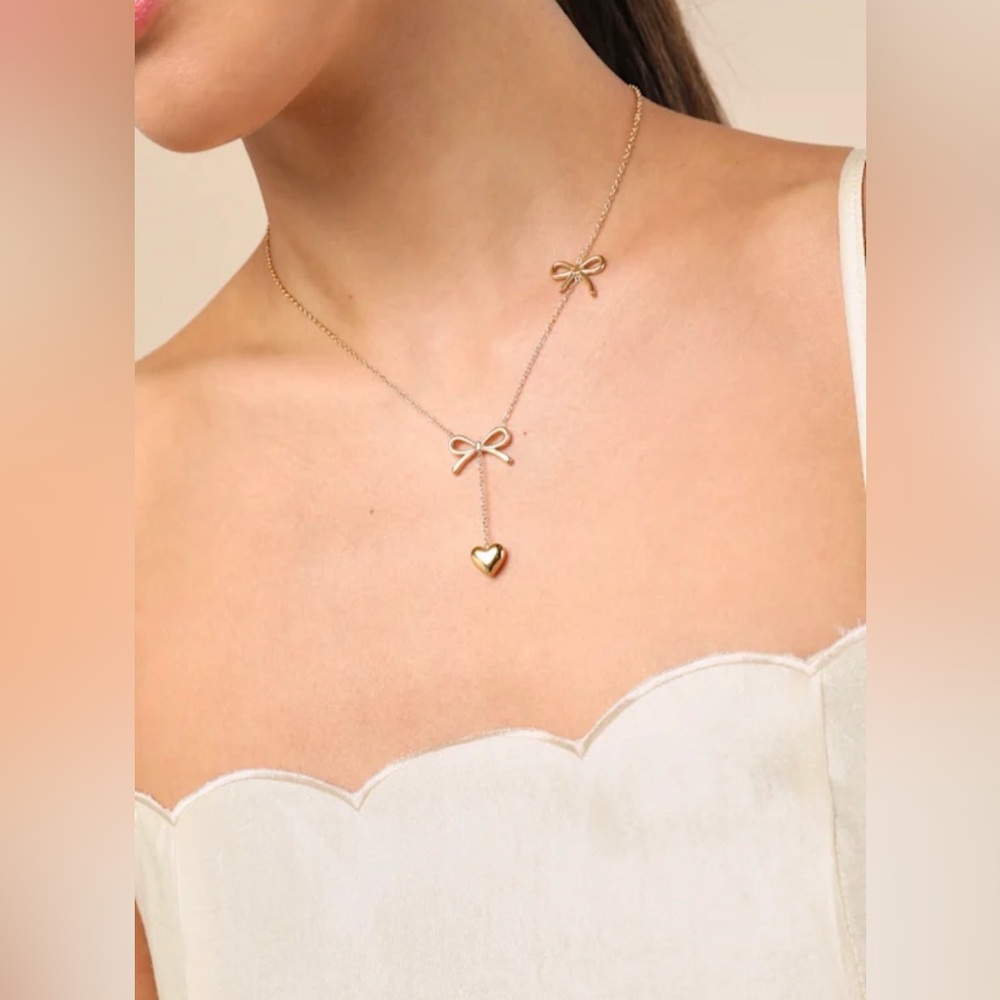 Lulus Chic Gold Bow and Heart Necklace